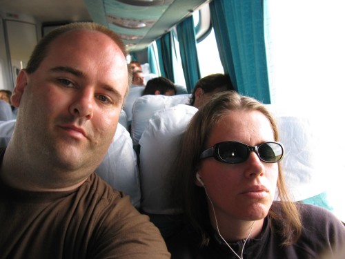 Leanne sleeps while Simon plays - bus to El Calafate
