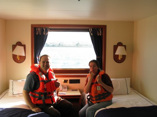 Trying on life jackets on board MV Via Australis