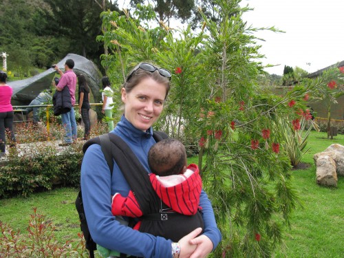 Leanne and Andres admire a bottlebrush