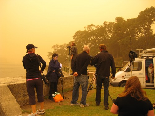 ABC TV crew prepare to go live at Blues Point to talk about the dust storm